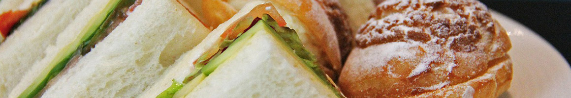 Eating Sandwich at Bagel Art Cafe restaurant in Evanston, IL.